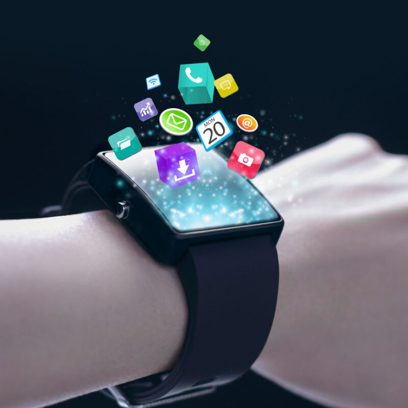 App Icons With Smartwatch. A Smartwatch Is A Wearable Computing Device That Closely Resembles A Wristwatch Or Other Time Keeping Device.